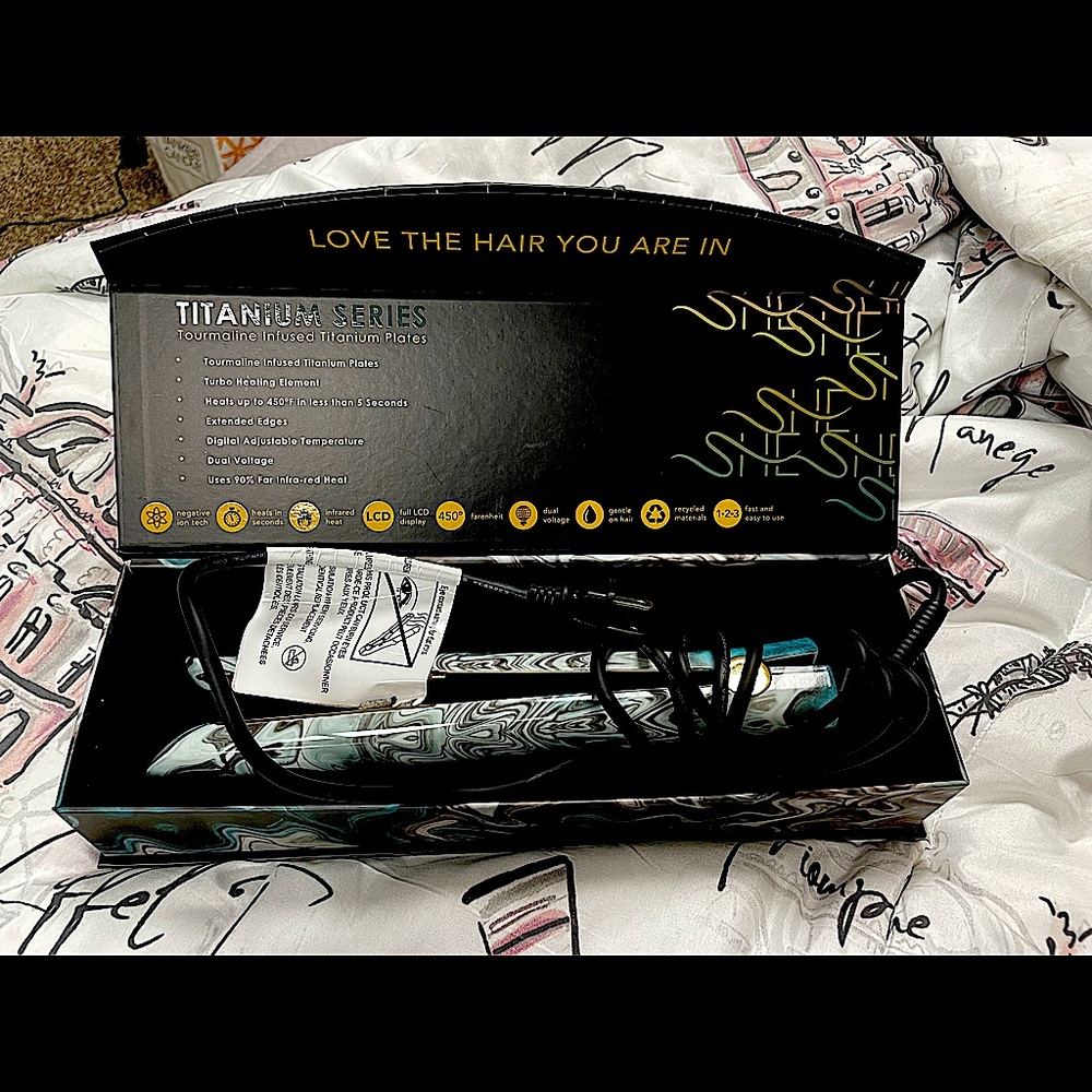 Titanium Hair straightener never used still in boxx regular price 399